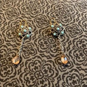 Earrings with teal and champagne colored bead